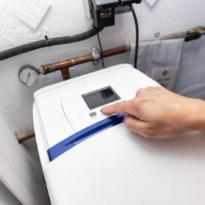 Programming pressurized water softeners in a home shed